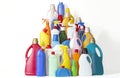 A lot of bottles with chemicals for cleaning. Different plastic bottles in the form of mountain. Royalty Free Stock Photo