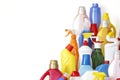 A lot of bottles with chemicals for cleaning. Different plastic bottles in the form of mountain. Royalty Free Stock Photo