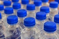 A lot of bottles worth with clean cool mineral water Royalty Free Stock Photo