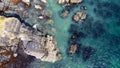 A lot of boulders in the sea water. Coastal cliffs of the North Atlantic. Seaside beautiful nature. Dramatic seascape of the north