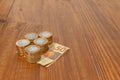 Lot of brazilian coins and bank notes on a wood table Royalty Free Stock Photo