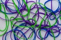 Lot of bright and colorful entangled rubber bands
