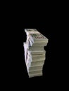 A lot of bundles of american dollars, on a black background. A bunch of one hundred dollar bills, packed in packs of ten thousand Royalty Free Stock Photo