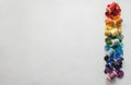 A lot of buttons and reels with colorful threads, laid out on a white background in the colors of the rainbow. Copy space Royalty Free Stock Photo