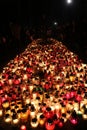 Candles in a cemetery on All Saints Day in Poland Royalty Free Stock Photo