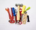 A lot of children's toy instruments gathered in a pile, bright c