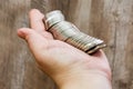 A lot of coins in the female hand Royalty Free Stock Photo