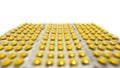 A lot of color yellow round tablets in a packs in a row. Pharmaceuticals and pills on a white background Royalty Free Stock Photo