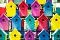 A lot of colorful birdhouses. The concept of the hostel, friendly neighborhood, common space