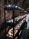 A lot of colorful candles glowing in Covadonga, Asturias, Spain. Religious symbol of the spanish reconquest by King Pelayo