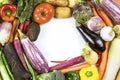 A lot of colorful fresh vegetable flat lay with circle shape copy space. Frame made of raw vegetables on white background, healthy Royalty Free Stock Photo