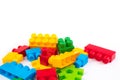 Lot of colorful rainbow toy bricks background. Educational toy, constructor for children Isolated on white background Royalty Free Stock Photo