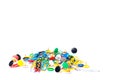 Colorful thumbtacks in white background