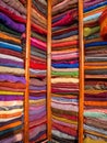 Lot of colorful traditional Moroccan scarves and shawls in a market Royalty Free Stock Photo