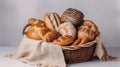 A lot of different bread in a wicker basket on a light background