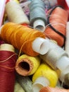 Lot of different colored spools of thread are a bunch Royalty Free Stock Photo