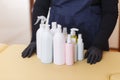 A lot of different cosmetic products for personal care. hands of the master of depilation