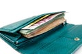 A lot of different euro banknotes in a women`s wallet on a white background. Close-up. Royalty Free Stock Photo