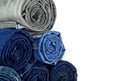 Lot of different jeans isolated on white background Royalty Free Stock Photo