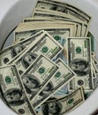 A lot of dollars in a toilet bowl. Money toilet Royalty Free Stock Photo