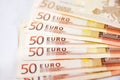 A lot of euro banknotes on white. 50 euros on the table. Money background. Close-up. Selective focus. Royalty Free Stock Photo