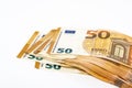 a lot of euro banknotes on white. 50 euros on the table. Money background. Close-up