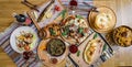 A lot of food on the wooden table. Georgian cuisine. Top view. Flat lay . Khinkali and Georgian dishes Royalty Free Stock Photo