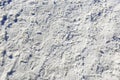 A lot of foot traces in the snow on sidewalk Royalty Free Stock Photo