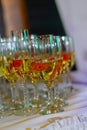 Glasses of white sparkling wine on the table Royalty Free Stock Photo