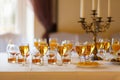 Lot of glasses of wine, juice and whiskey on the buffet table Royalty Free Stock Photo