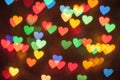 A lot of glowing multi-colored hearts