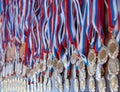 A lot of gold medals with ribbons Royalty Free Stock Photo