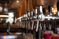 A lot of Golden beer taps at the bar Royalty Free Stock Photo