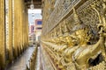 Lot of golden garuda on wall around temple Emerald Buddha, Grand Palace, Bangkok, Thailand Royalty Free Stock Photo