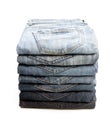Lot of grey used women jeans stacked in a pile isolated on white Royalty Free Stock Photo
