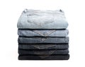 Lot of grey used women jeans stacked in a pile isolated on white Royalty Free Stock Photo