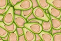 Lot of halves of fresh avocado. Background