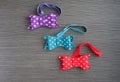 A lot of handmade bow tie on a wooden background Royalty Free Stock Photo