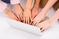 Lot of hands with grey laptop Royalty Free Stock Photo