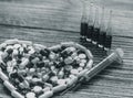 A lot of heart-shaped pills lie on the table. Vitamins for immunity. Stay home stay safe Royalty Free Stock Photo