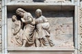 Lot and his daughters flee from Sodom, marble relief on the facade of the Milan Cathedral