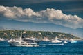 A lot of huge yachts are in harbour near port Hercules of Monaco at sunny day, megayachts are moored in sea, is a yacht Royalty Free Stock Photo