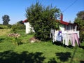 Lot of laundry hanging and drying in the yard on a sunny day Royalty Free Stock Photo