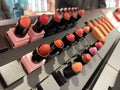 Lot of lip stick testers in make up in superstore