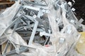 A lot of metal galvanized iron chrome construction fasteners for the facade of the building, parts, corners for repair.