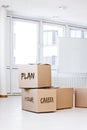 Lot of moving boxes in an empty white office Royalty Free Stock Photo