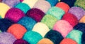 A lot of multi-colored balls of cotton for knitting close-up. Colored skeins of thread for needlework. Selective focus image Royalty Free Stock Photo