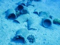 lot of old amphorae on the sandy seabed in the red sea egypt detail