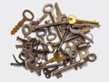 Lot of old used keys from long ago broken and lost locks Royalty Free Stock Photo