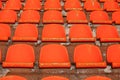 a lot of orange tribune at the stadium Royalty Free Stock Photo